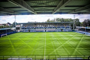 Play a match in the King Power at Den Dreef Stadium