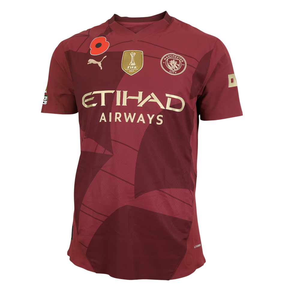 Jahmai Simpson-Pusey Manchester City shirt