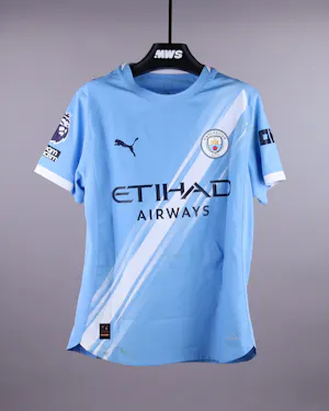 Nathan Aké Manchester City camisa.