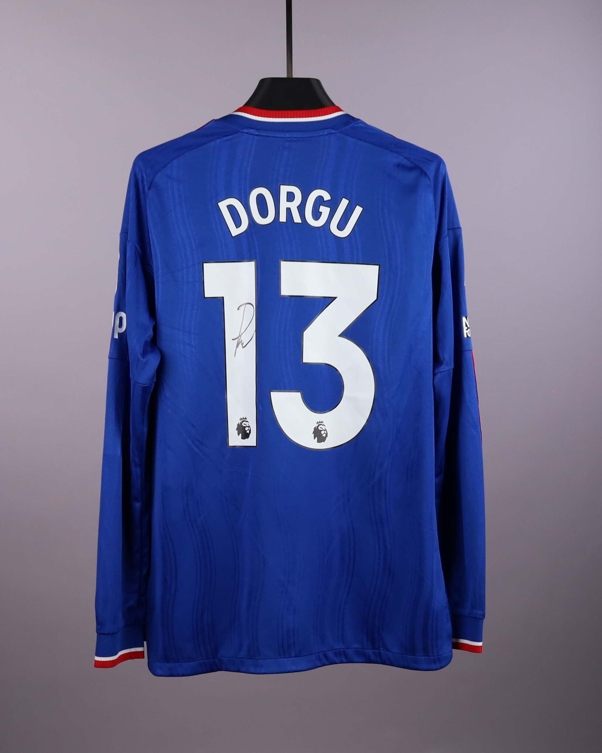 Patrick Dorgu Manchester United camisa.