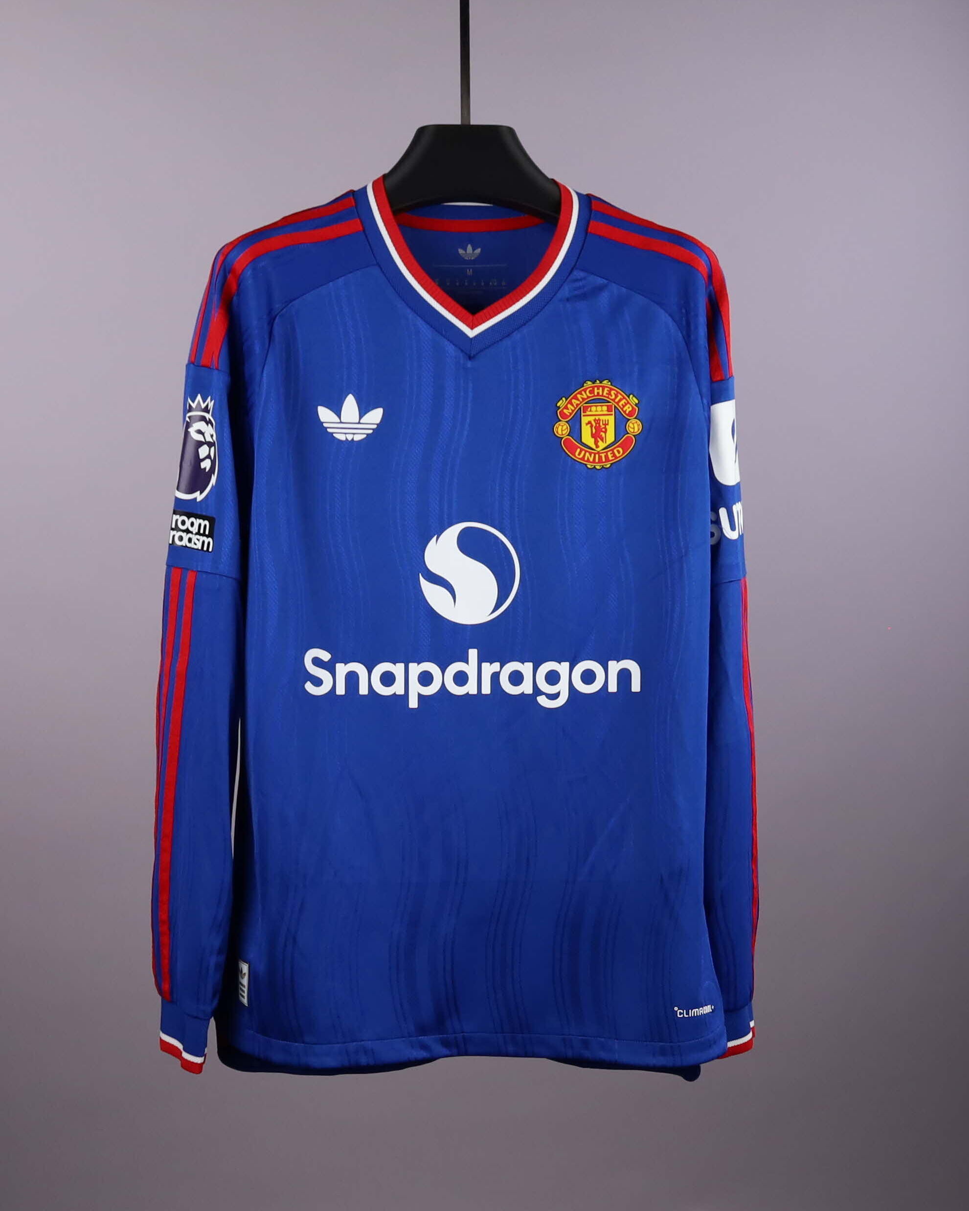 Patrick Dorgu Manchester United camisa.